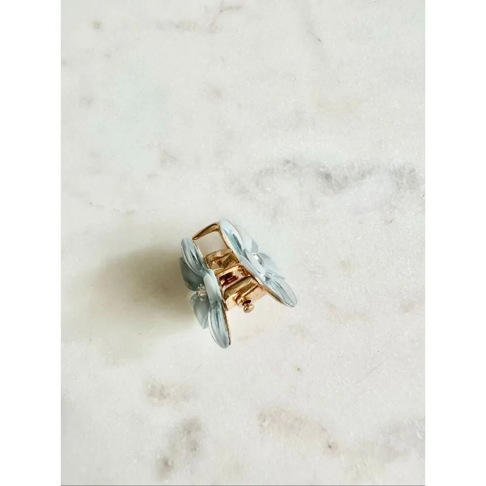 Delicate light blue sparkly flower hair clip